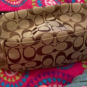 Small coach hand bag.